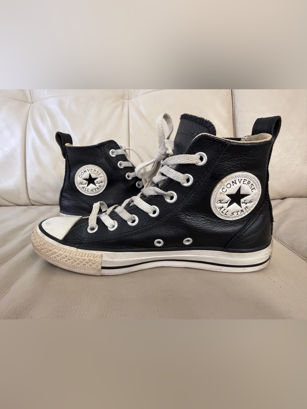 Converse Black and White Leather High Top Sneakers